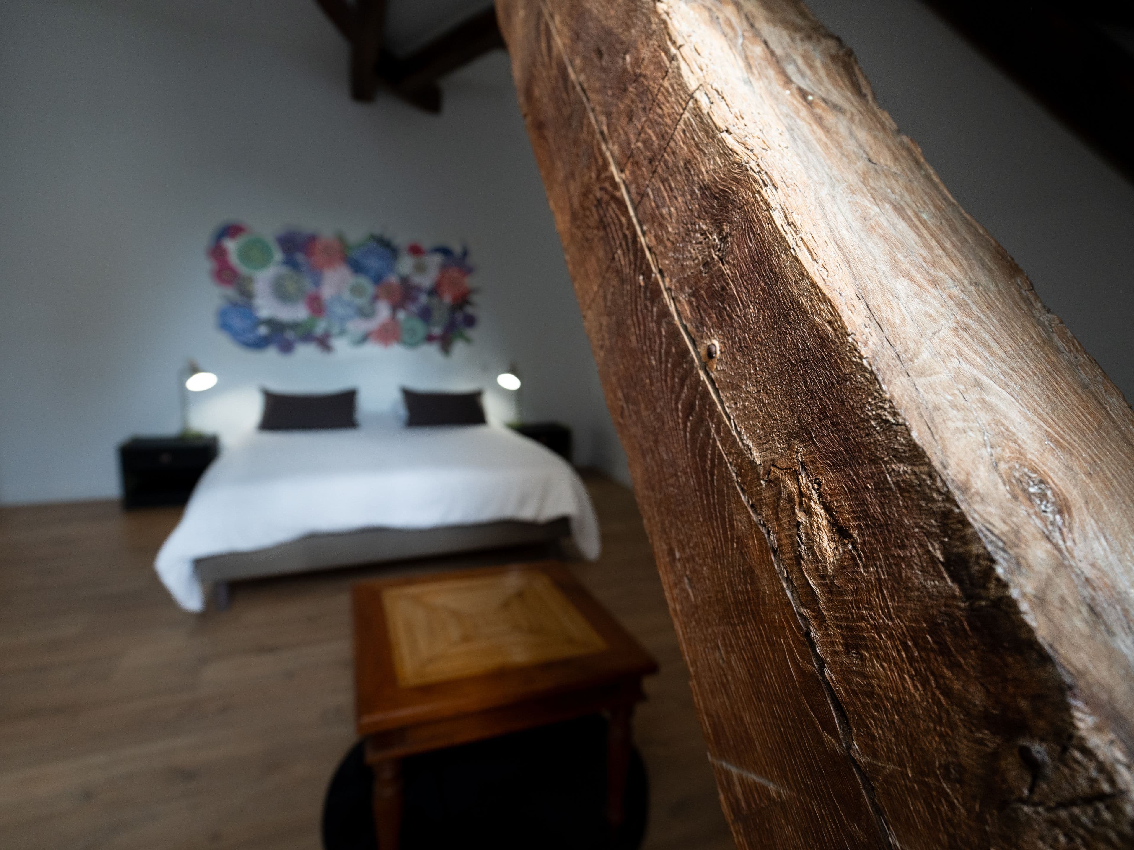 Photo de la chambre Hondaa avec poutres en bois